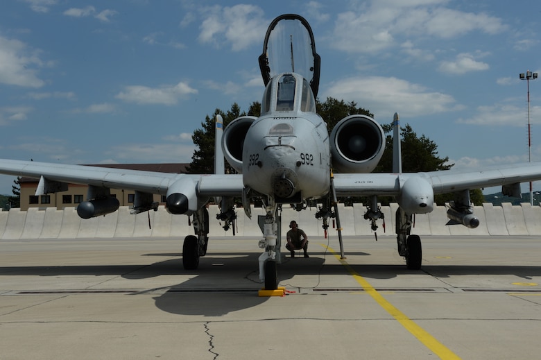 A U.S. Air Force crew chief assigned to the 354th Expeditionary Fighter Squadron runs pre-flight checks of an A-10 Thunderbolt II during a theater security package deployment at Sliac Air Base, Slovakia, May 18, 2015. The U.S. Air Force’s forward presence in Europe allows cooperation among NATO allies and partners to develop and improve ready air forces capable of maintaining regional security. (U.S. Air Force photo by Senior Airman Dylan Nuckolls/Released)