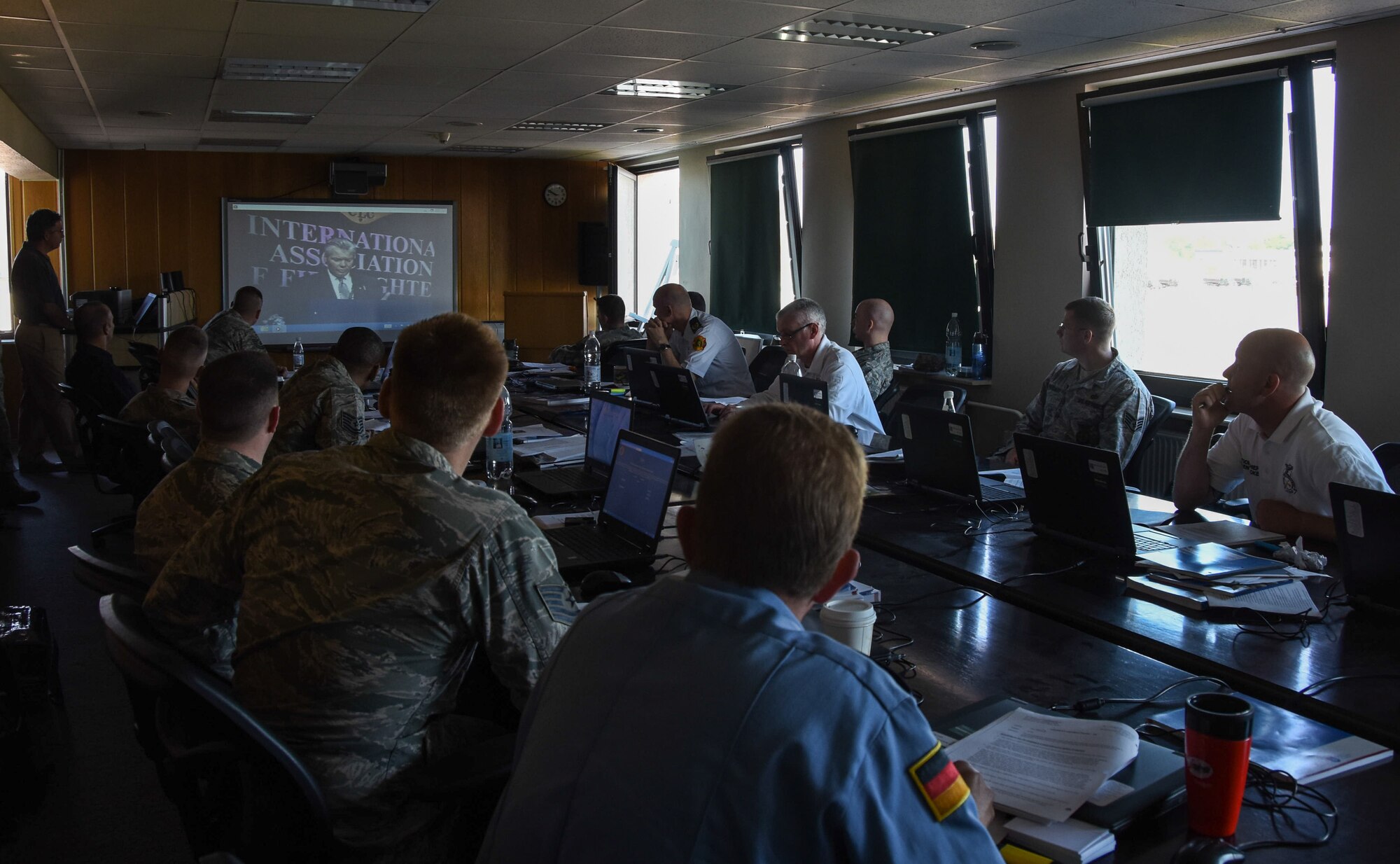 Military and civilian firefighters from across U.S. Air Forces in Europe watch a video on risk management, during a 10-day advanced fire protection course May 13, 2015 at Ramstein Air Base.  The course was designed to prepare mid-level supervisors for the role of assistant chief of operations by teaching human resource management, budgeting and comprehensive emergency management procedures. (U.S. Air Force photo by Staff Sgt. Jonathan Hehnly/Released)
