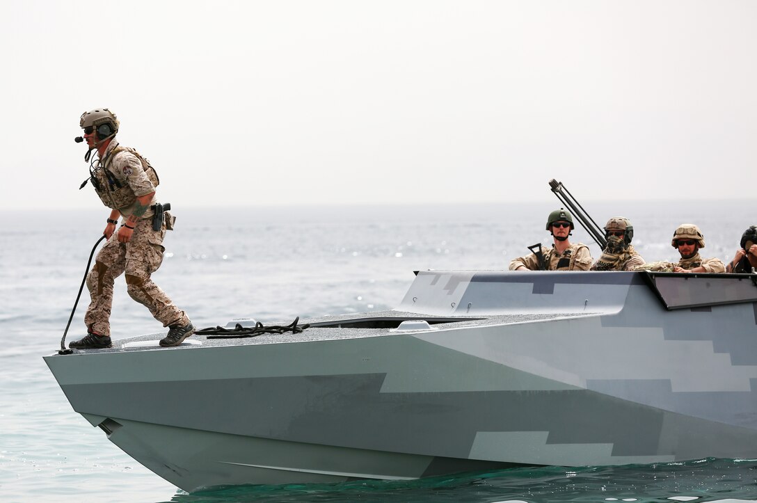 Commandos operate during Eager Lion 2015  in front of dignitaries and media off the coast of Aqaba, Jordon, May 18, 2015.