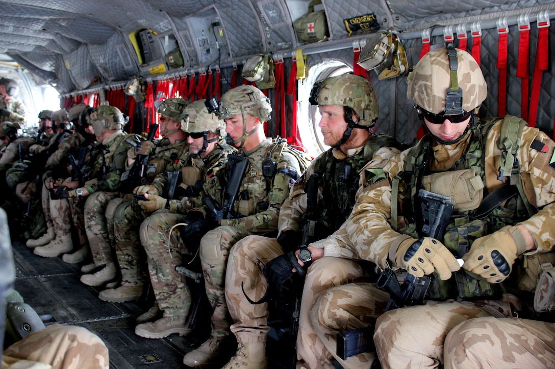 U.s., Czech, And Georgian Soldiers Sit Inside A Ch-47 Chinook 