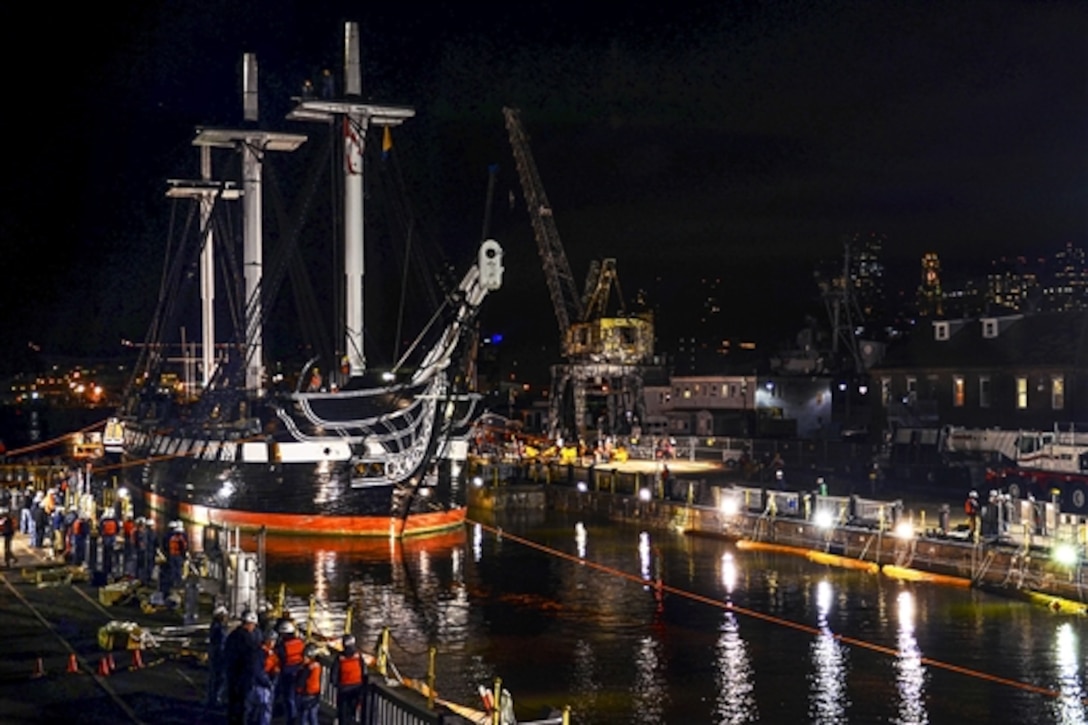 The USS Constitution enters dry dock in Charlestown Navy Yard, Charlestown, Mass., May 18, 2015, to begin several years of restoration. This is Constitution's first time in dry dock since its 1992-1996 restoration.