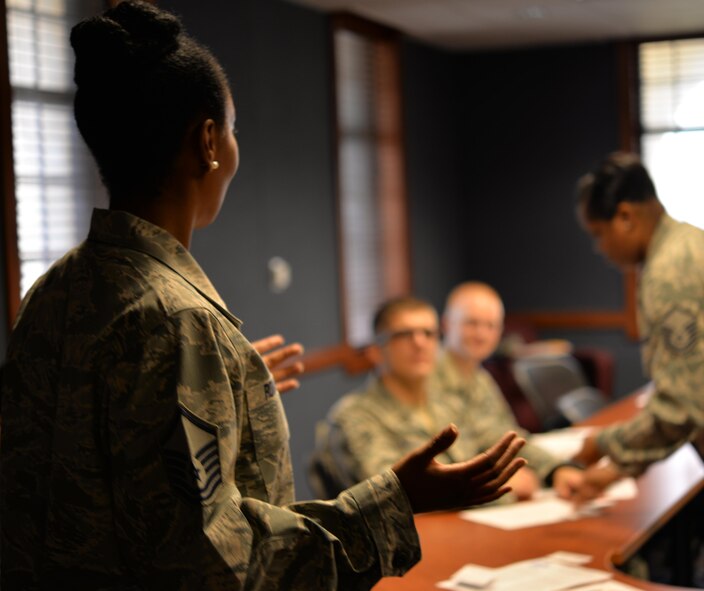 Master Sgt. Sanelle Romero, Joint Base San Antonio-Randolph Career Assistance Advisor, speaks to a group of Airmen during a professional development seminar. Air Force CAAs are charged with scheduling and facilitating professional development seminars for Airmen at all levels, and being advisors on retention, pay and benefits programs. Career Assistance Advisors are one of 10 special duties identified as Developmental Special Duties. (U.S. Air Force photo by Tech. Sgt. Beth Anschutz) 