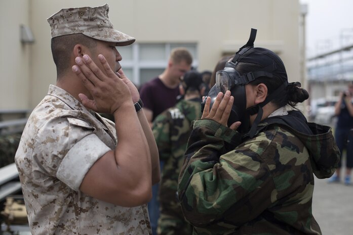 Marine Aircraft Group 12 and Headquarters and Headquarters Squadron hosted the 2015 Jane Wayne Day, May 16, aboard Marine Corps Air Station Iwakuni, Japan. Jane Wayne Day provides spouses and family members of Marines and sailors with the opportunity to get a taste of Marine Corps training and experience a day in the life of a Marine.
