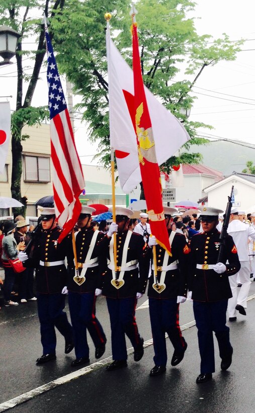 The Marines of the CATC Camp Fuji Color Guard proudly bear the National Flags of the U.S. and Japan, as well as the Marine Corps Standard, at the Shimoda Black Ships Festival.