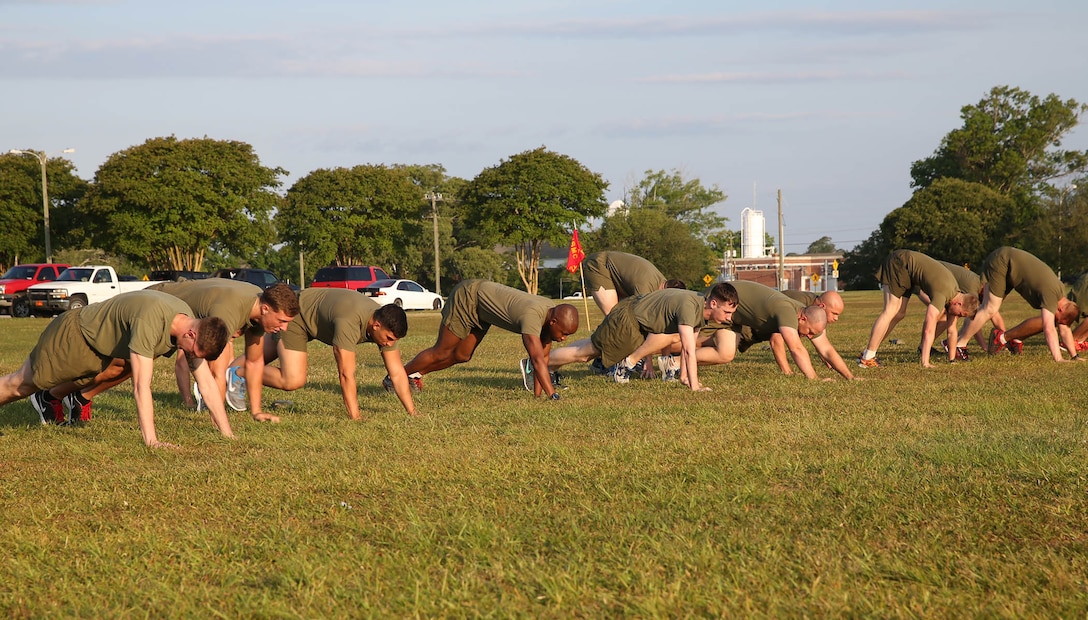 U.S. Marines with the 22nd Marine Expeditionary Unit perform a dynamic warm up as part of an operational pause (OP) at Marine Corps Base Camp Lejeune, N.C., May 19, 2015. The MEU participated in the OP to increase a safety-minded culture focusing on risk management, on and off duty safe behavior, and combat readiness. (U.S. Marine Corps photo by Cpl. Caleb McDonald/Released)