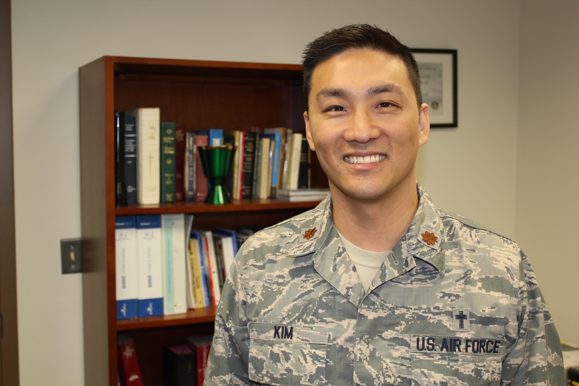 Chaplain (Maj.) Joshua Kim, 459th Air Refueling Wing chaplain, poses for a photo at the 459 ARW chaplain's office at Joint Base Andrews May 3, 2015. Kim is the winner of the 2014 U.S. Air Force Chaplain Corps Thoran T. Thielen award, and the 2014 U.S. Air Force Reserve Chaplain Corps Individual Award for Excellence. (U.S. Air Force photo by: Tech. Sgt. Brent A. Skeen)
