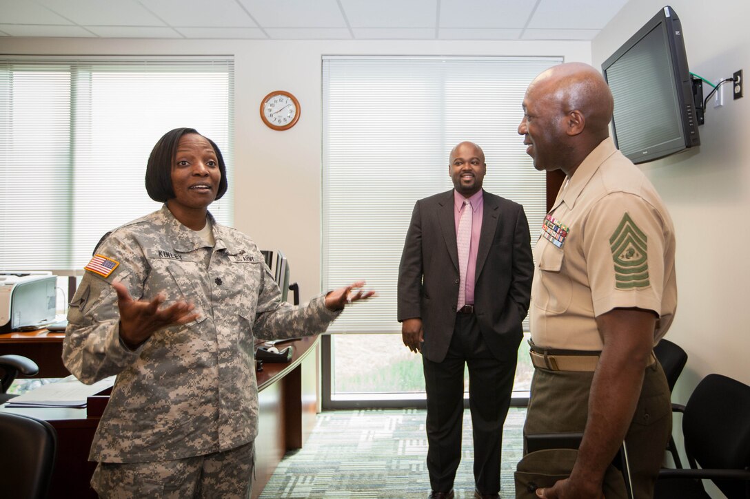 Sgt. Maj. Ronald L. Green, the 18th Sergeant Major of the Marine Corps, tours Digital Media Activity at Ft. George G. Meade, MD., May 19, 2015. (U.S. Marine Corps photo by Sgt. Melissa Marnell)