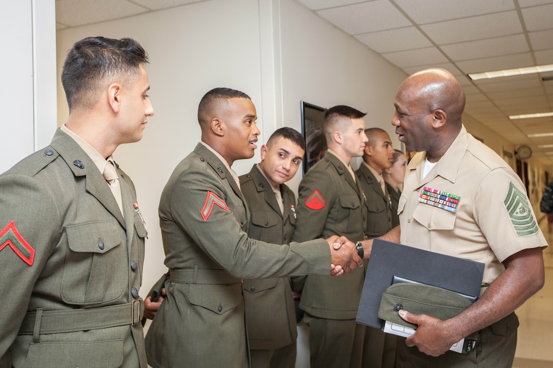 Sgt. Maj. Ronald L. Green, the 18th Sergeant Major of the Marine Corps, tours the Defense Information School at Ft. George G. Meade, MD., May 19, 2015. (U.S. Marine Corps photo by Sgt. Melissa Marnell)