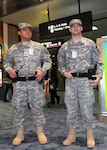 Army Spc. Jesus Garcia Salazar and Army Pfc. Josh King, both with the 72nd 
Military Police Company, stand guard at McCarran International Airport for the 
ninth annual Vigilant Sentinel exercise here, Dec. 31, 2010. Nevada National 
Guardmembers supported Las Vegas Metro Police by providing extra security for 
the holiday.