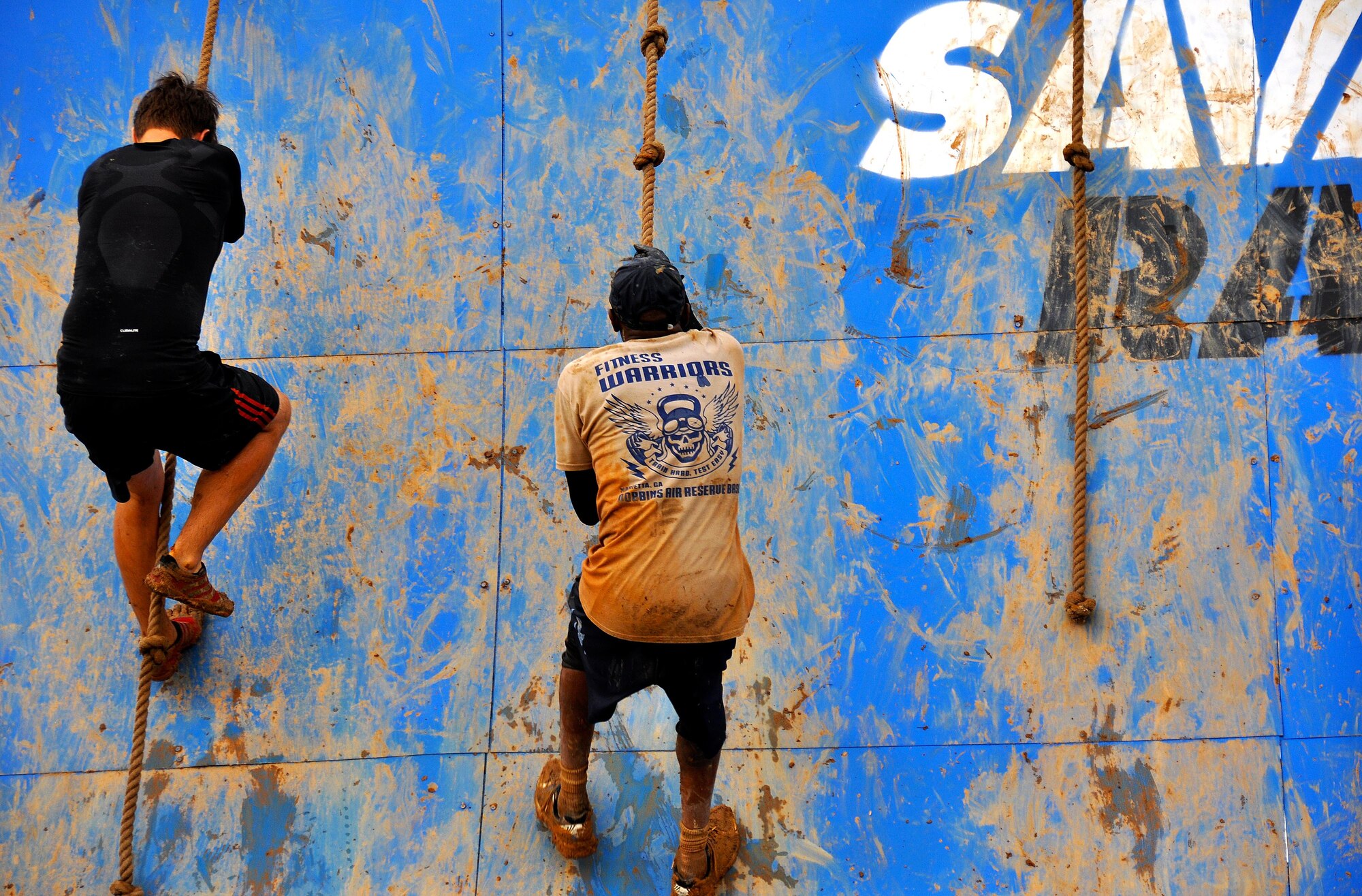 Senior Master Sgt. Eric Jones, 94th Logistics Readiness Squadron, attempts to climb the Colossus during the Georgia Spring 2015 Savage Race in Dallas, Ga., April 18, 2015. The Colossus was a giant 43-foot wall and one of the hardest obstacles in the course. Adding to the difficulty of it being one of the final obstacles, runners had to sprint up the barrier after they’d already sledged through more than four miles in the mud, before grabbing a rope. They would then pull themselves up to the top of the fortification. The Savage Race is an Air Force Reserve sponsored obstacle course that challenges participants in more than 20 different trials over the course of five miles. (U.S. Air Force photo/Senior Airman Daniel Phelps)