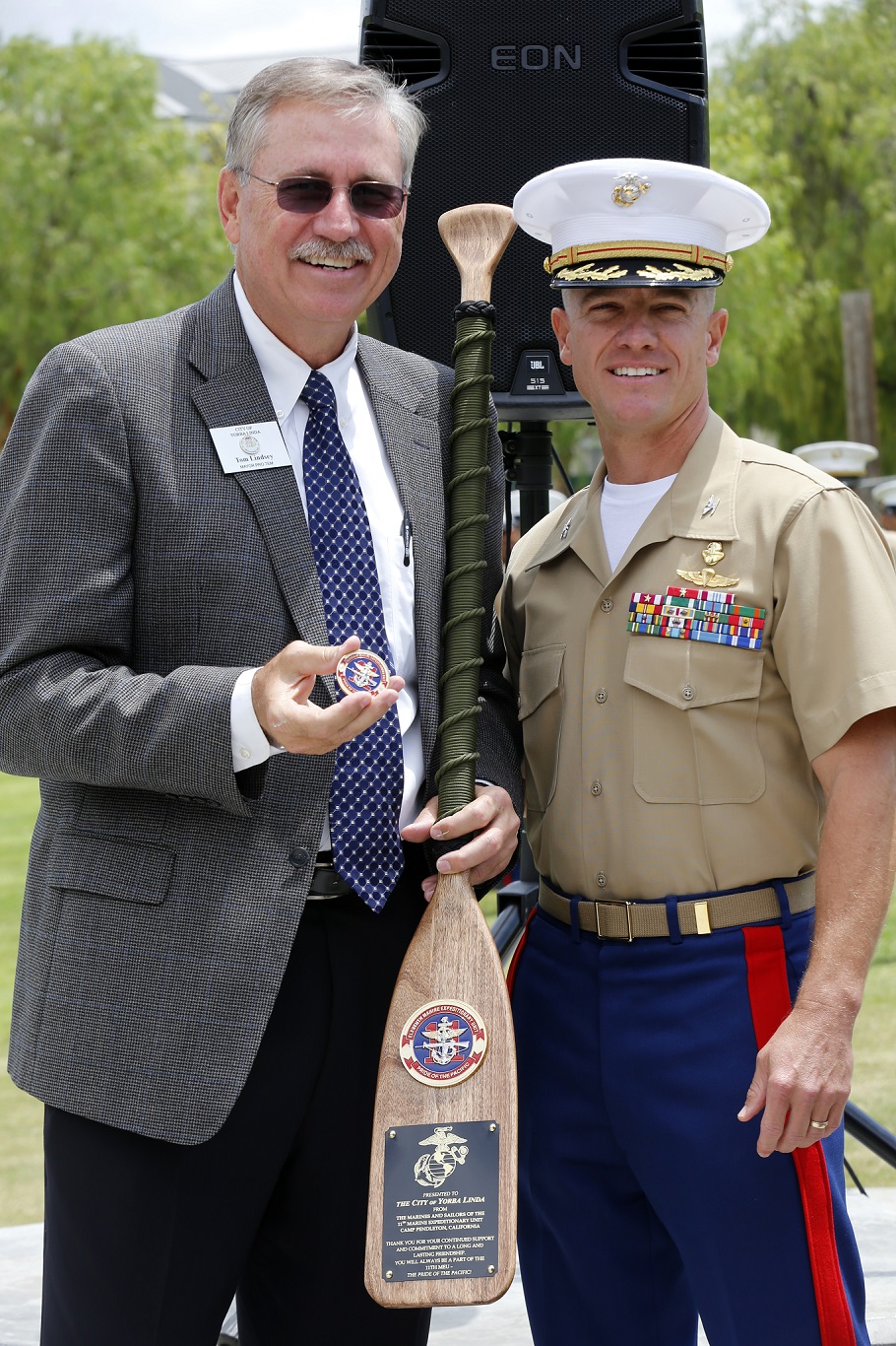The Mayor Pro Tem of Yorba Linda, Tom Lindsey, left, and Col. Matthew G. Trollinger, commanding officer of the 11th Marine Expeditionary Unit, stand for a photo during the adoption ceremony of the 11th MEU by the city of Yorba Linda. The 11th MEU is a flexible, adaptable, and persistent force capable of rapidly responding to crises and contingencies. (U.S. Marine Corps photos by Gunnery Sgt. Rome M. Lazarus/Released)