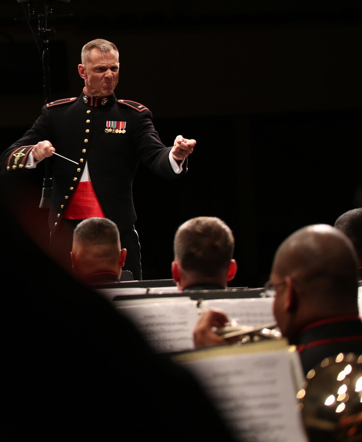 Chief Warrant Officer 3 Bryan Sherlock conducts the Marine Corps Band New Orleans during an evening concert at Foothills Alliance Church in Calgary, Alberta, May 2, 2015. The band conducted their spring tour through Canada and the northern United States April 29 – May 11, 2015. The tour included combined concerts with the HMCS Tecumseh Royal Canadian Navy Reserve Band, as well as the University of Montana wind ensemble. The band performed concerts in Calgary, Alberta, Canada; Missoula and Billings, Mont.; Rapid City, S.D., and Cheyenne, Wyo., giving the Marines a chance to tell the Marine Corps’ story through music across North America. 