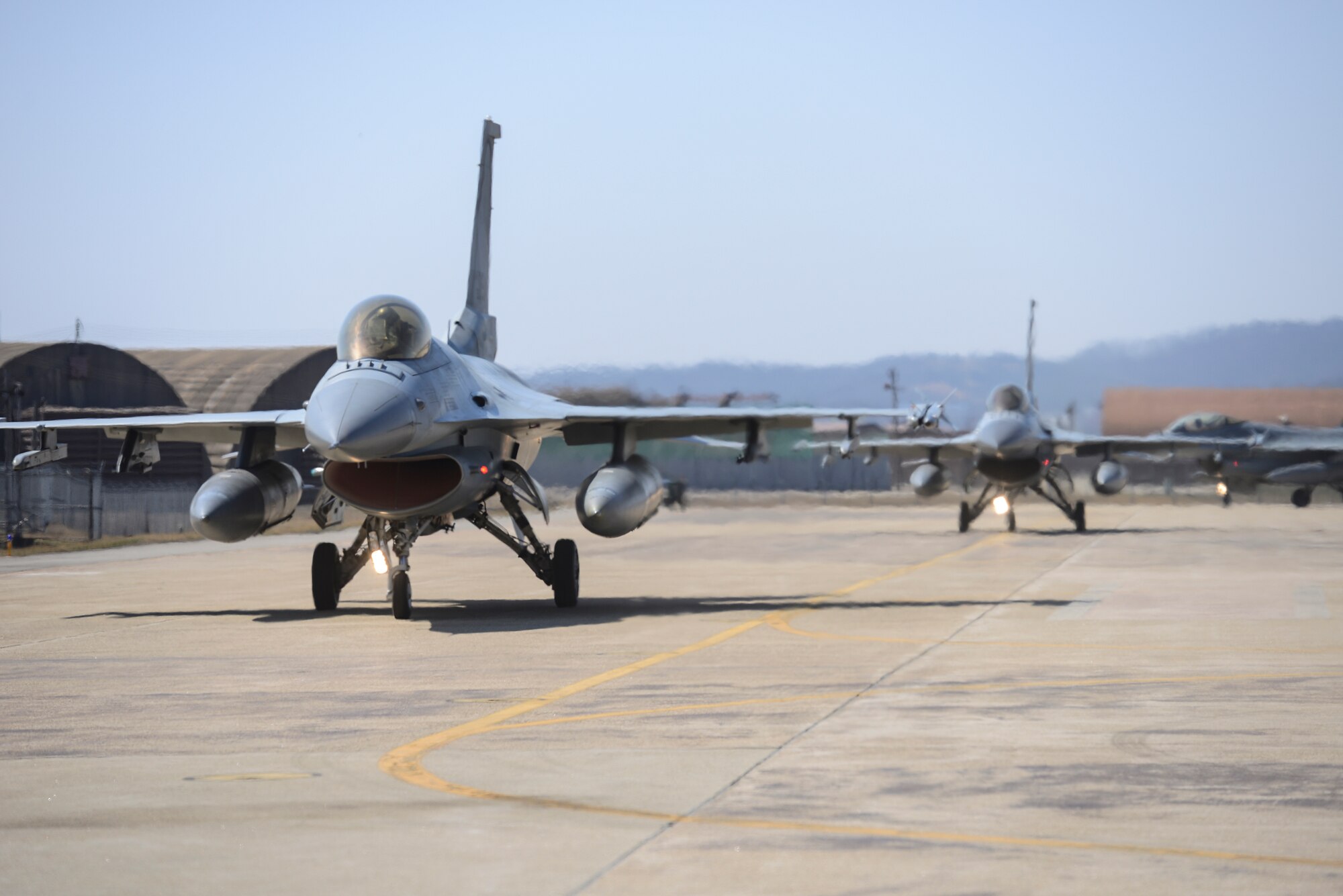 Republic of Korea F-16 Fighting Falcons arrive for Buddy Wing 15-3 March 23, 2015, at Osan Air Base, ROK. During Buddy Wing, members from each air force share tactics and procedures to become familiar with how each other work during flying missions. (U.S. Air Force photo by Senior Airman Matthew Lancaster)
