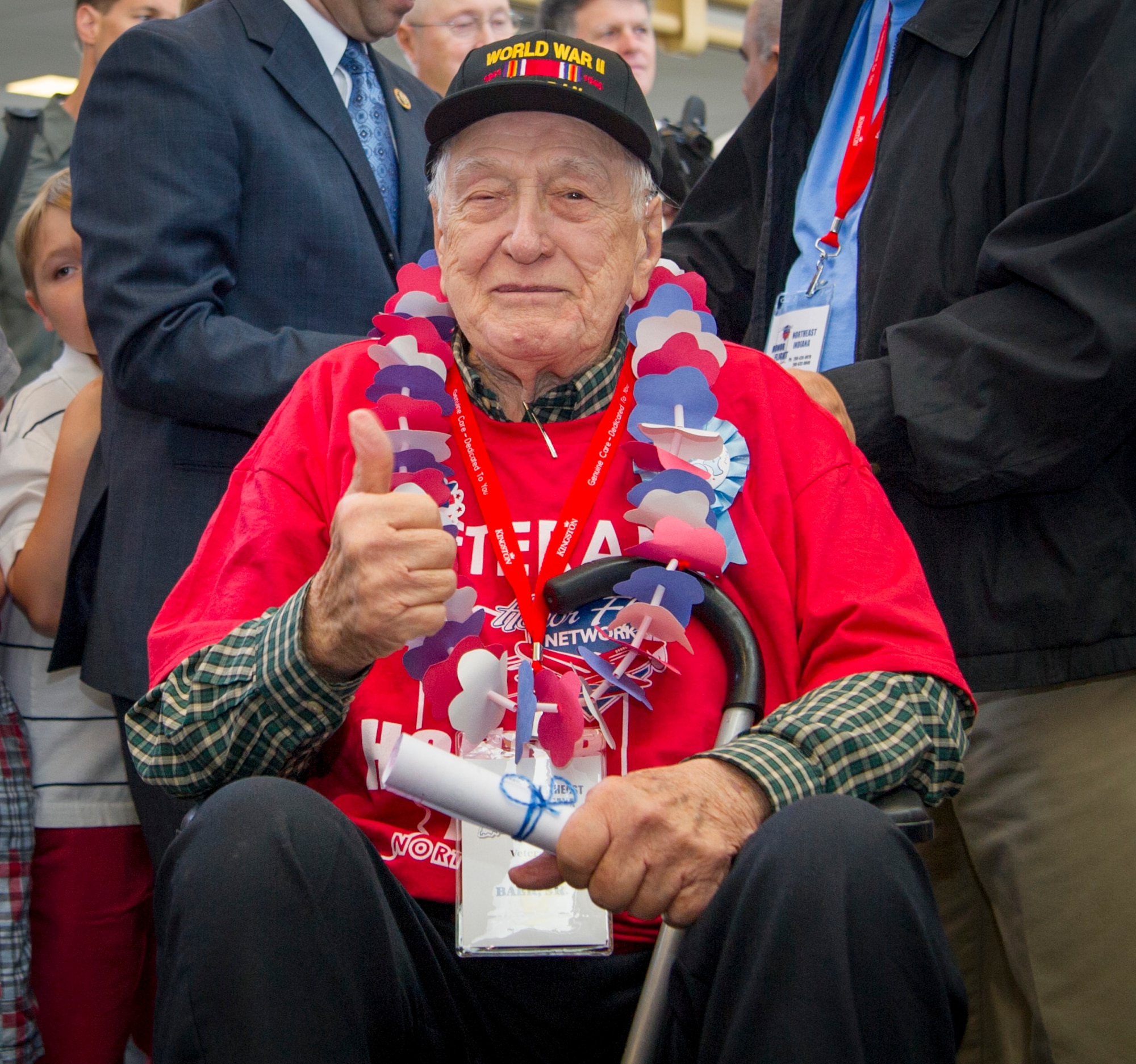 Art Baer Sr., World War II veteran, gives a thumbs-up after arriving at Ronald Reagan Washington National Airport in Arlington, Va., May 20, 2015. Baer is part of the Northeast Indiana Honor Flight. (U.S. Air Force photo/Airman 1st Class Ryan J. Sonnier)