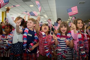 Francis Scott Key Elementary School students cheer for the arrival of the Northeast Indiana Honor Flight at Ronald Reagan Washington National Airport in Arlington, Va., May 20, 2015. The Honor Flight Network is a non-profit organization created to honor America’s veterans for their sacrifices by bringing them to visit and reflect at their memorials. (U.S. Air Force photo/Airman 1st Class Ryan J. Sonnier)