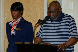 Retired U.S. Army Chaplain (Col.) Lilton Marks reads an invocation during the Joint Base Langley-Eustis Retiree Appreciation Day at Fort Eustis, Va., May 16, 2015. Marks also spoke at the 50th Vietnam War Commemoration luncheon the previous day to help honor the Vietnam Veterans in attendance.  (U.S. Air Force photo by Senior Airman Kimberly Nagle/Released)  