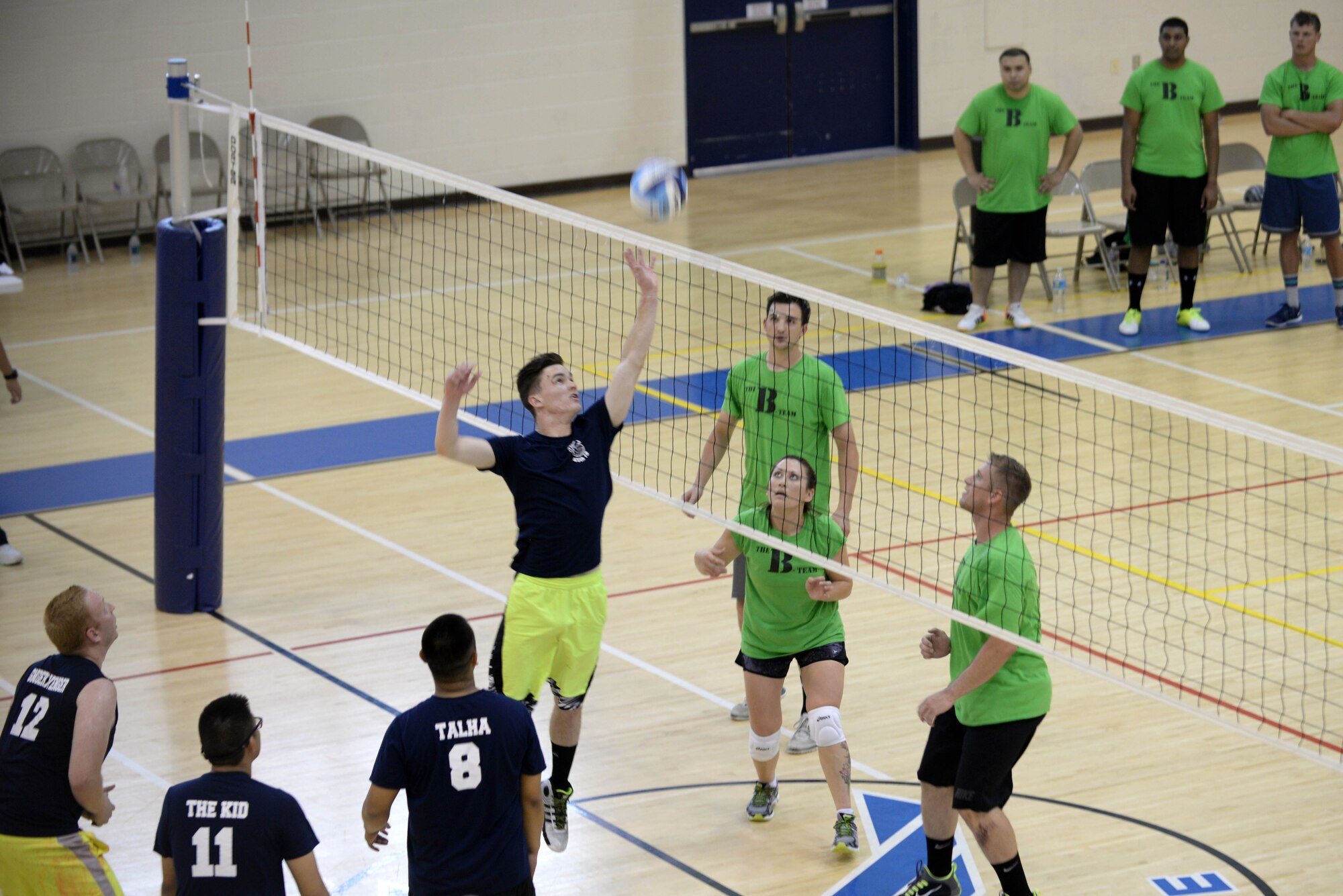 Doug Brown, 45th Intelligence Squadron, spikes the ball during the intramural volleyball championship game at Langley Air Force Base, Va., May 19, 2015. The 45th IS lost the game with a score of 21 to 25. (U.S. Air Force photo by Staff Sgt. Teresa J. Cleveland/Released)