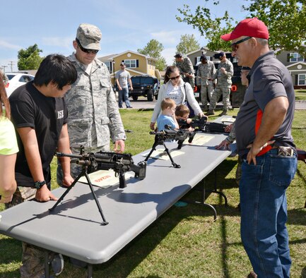 The 72nd Security Forces Squadron set up weapons and vehicle displays at the Tinker Exchange and Balfour Beatty Community Center during the 2015 Police Week. (Air Force photo by Kelly White/Released)
