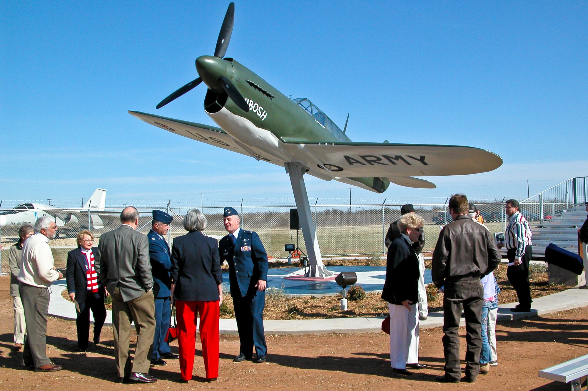 A replica of Lt. Col. William Dyess’ P-40 Warhawk, named Kibosh, was installed at the front gate of Dyess Air Force Base in his memory. (Courtesy Photo)