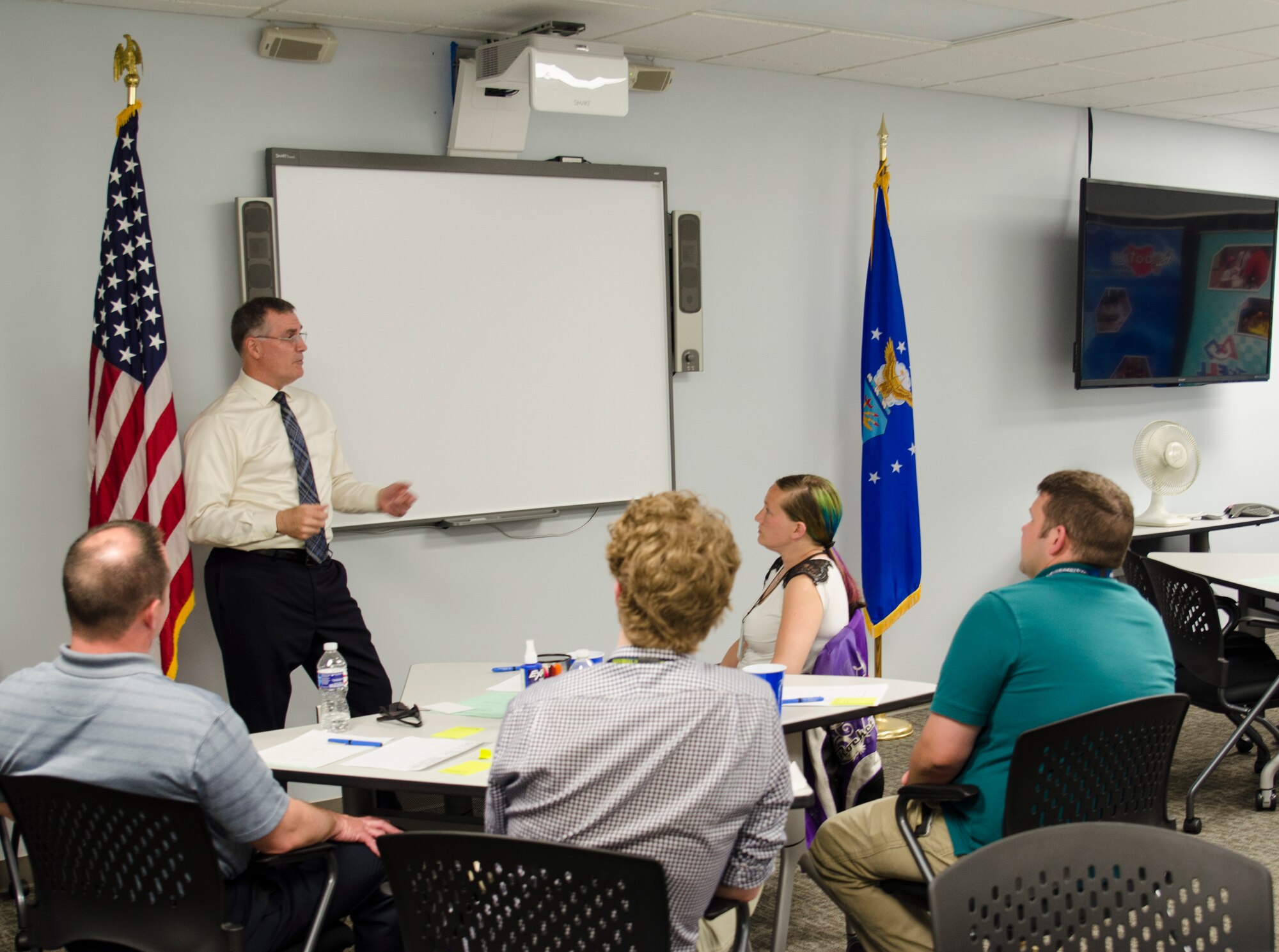 Mr. Ricky Peters, AFRL executive director, responds to feedback provided by student participants of the Community College Internship Pilot Program. (U.S. Air Force photo by Keith Lewis)