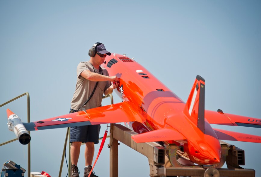 A PAE maintainer from the 82nd Aerial Targets Squadron prepares a BQM-167 for launch May 12 at Tyndall Air Force Base, Fla. This subscale target is used for live weapons system evaluations and testing. The 82nd ATRS operates QF-4, QF-16 and BQM-167 targets to provide manned and unmanned aerial targets support for programs across the Department of Defense. (U.S. Air Force photo/Sara Vidoni)