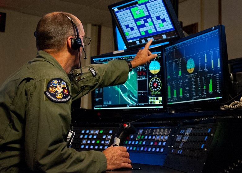 Retired Lt. Col. Thomas Mudge, a ground controller for the 82nd Aerial Targets Squadron, remotely pilots a QF-4 during a Combat Archer mission May 12 at Tyndall Air Force Base, Fla. The unmanned QF-4 was used as a full-scale target and shot down by a pilot from the 177th Fighter Wing, a New Jersey Air National Guard unit participating in the operation. Combat Archer is the air-to-air component of the 53rd Wing’s weapons system evaluation program.  The 82nd ATRS operates QF-4, QF-16 and BQM-167 targets to provide manned and unmanned aerial targets support for programs across the Department of Defense. (U.S. Air Force photo/Sara Vidoni)