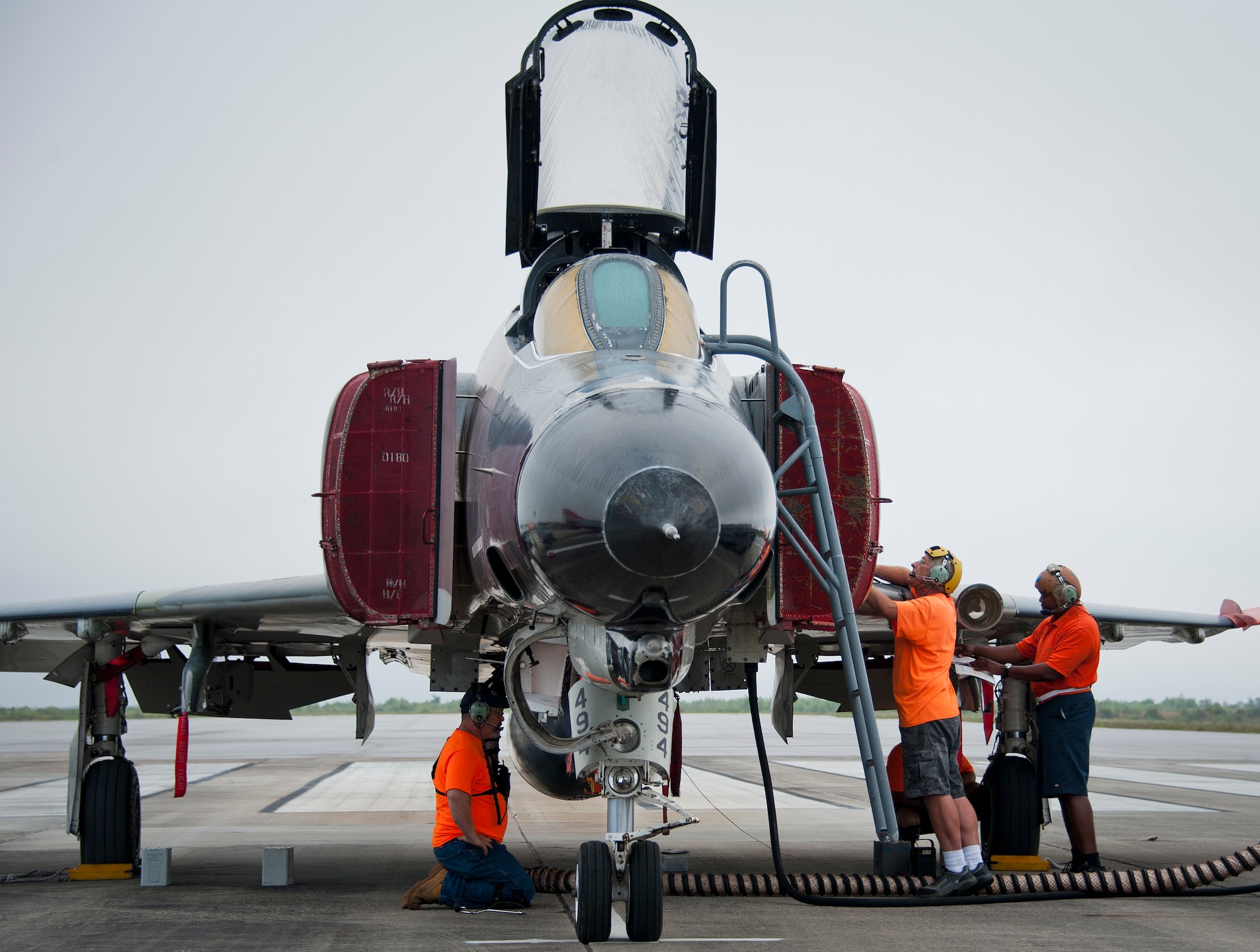 Maintainers with PAE prepare a QF-4 for takeoff on the drone runway May 12 at Tyndall Air Force Base, Fla. This unmanned QF-4 was used as a full-scale target and shot down by a pilot from the 177th Fighter Wing, a New Jersey Air National Guard unit, who were participating in Combat Archer. Combat Archer is the air-to-air component of the 53rd Wing’s weapons system evaluation program. The 82nd Aerial Targets Squadron operates QF-4, QF-16 and BQM-167 targets to provide manned and unmanned aerial targets support for programs across the Department of Defense. The QF-4 mission for the 82nd ATRS at Tyndall came to an end in May, with the squadron transitioning to QF-16s for all future full-scale target operations. (U.S. Air Force photo/Sara Vidoni)