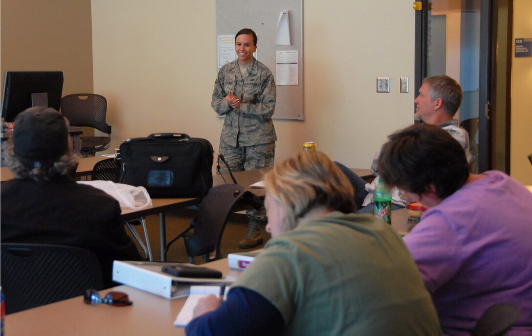 2nd Lt. Randi Luster, the 178th Wing Communications Flight director of operations, teaches Springfield residents effective meeting facilitation skills at Clark State Community College in Springfield-Clark County, Ohio, May 13, 2015. 178th Wing Airmen participated in the Building Leaders to Build Community program. The program teaches residents how to rebuild neighborhoods into great places to live, work and play. (Ohio Air National Guard photo by Airman Rachel Simones/Released)