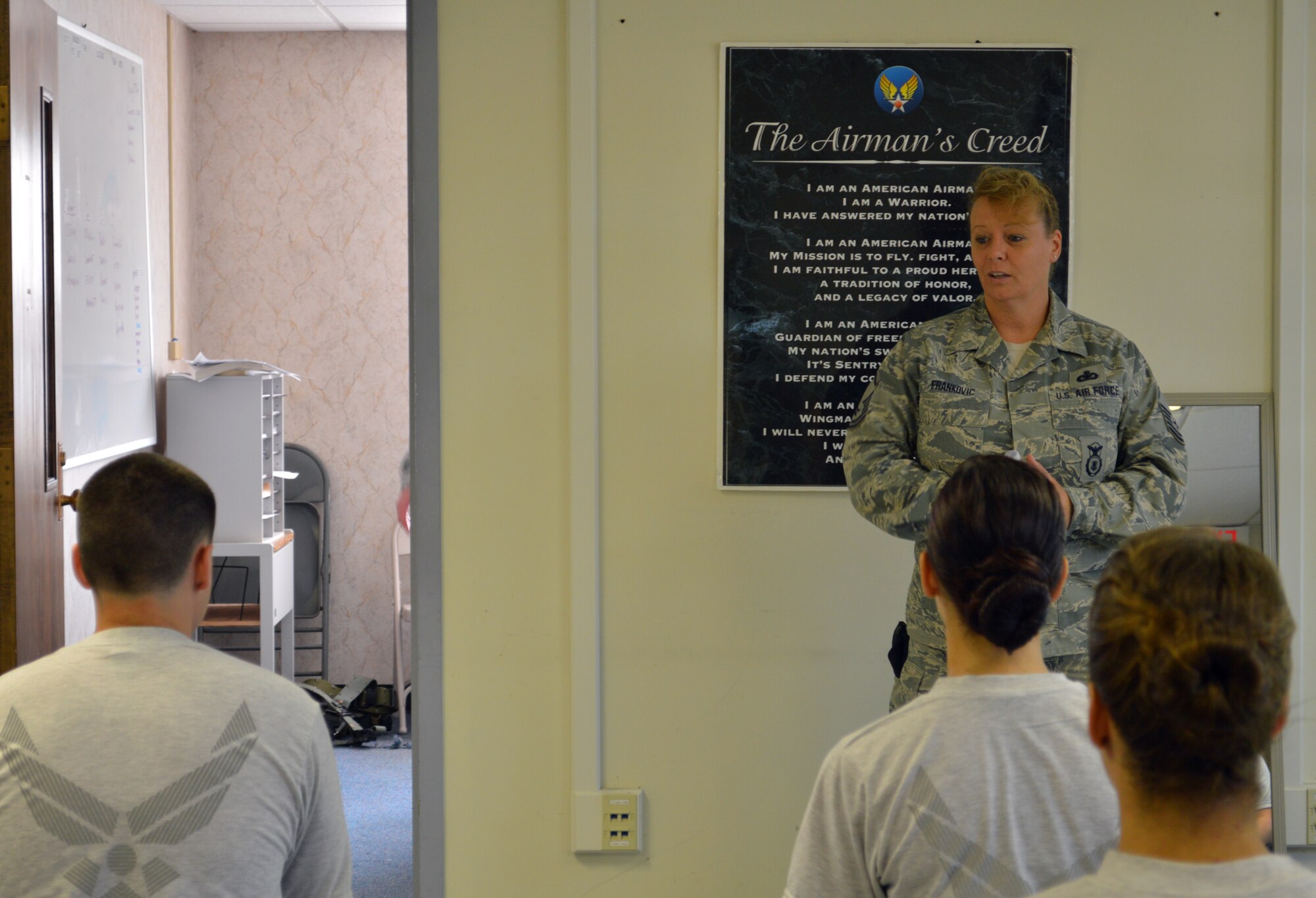 Master Sgt. Marlene Frankovic talks to the 109th Student Flight about dress and appearance May 17, 2015, at Stratton Air National Guard Base, New York. Frankovic, 109th Security Forces Squadron, is one of three cadre assigned to the flight, which recently underwent many changes to help ensure 100-percent graduation at Basic Military Training. (U.S. Air National Guard photo by Tech. Sgt. Catharine Schmidt/Released)