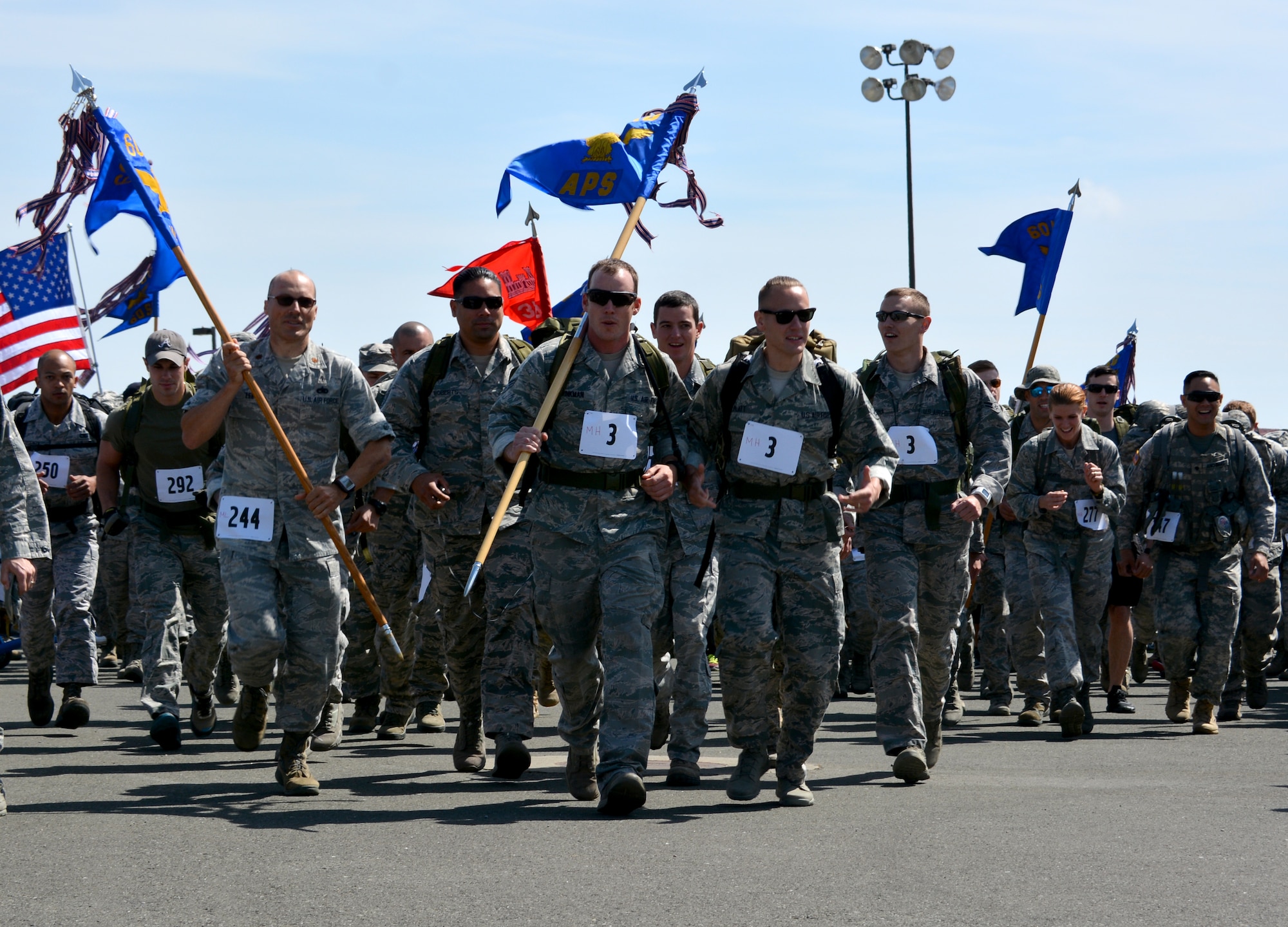 Travis Airmen participate in the 5th Annual Gold Star Families Ruck March, May 16, 2015, at Travis Air Force Base, California. The Travis First Sergeants Council hosted the fifth annual Gold Star Ruck March in support of Gold Star Families throughout the local community and across the country. (U.S. Air Force photo by Senior Airman Charles Rivezzo)