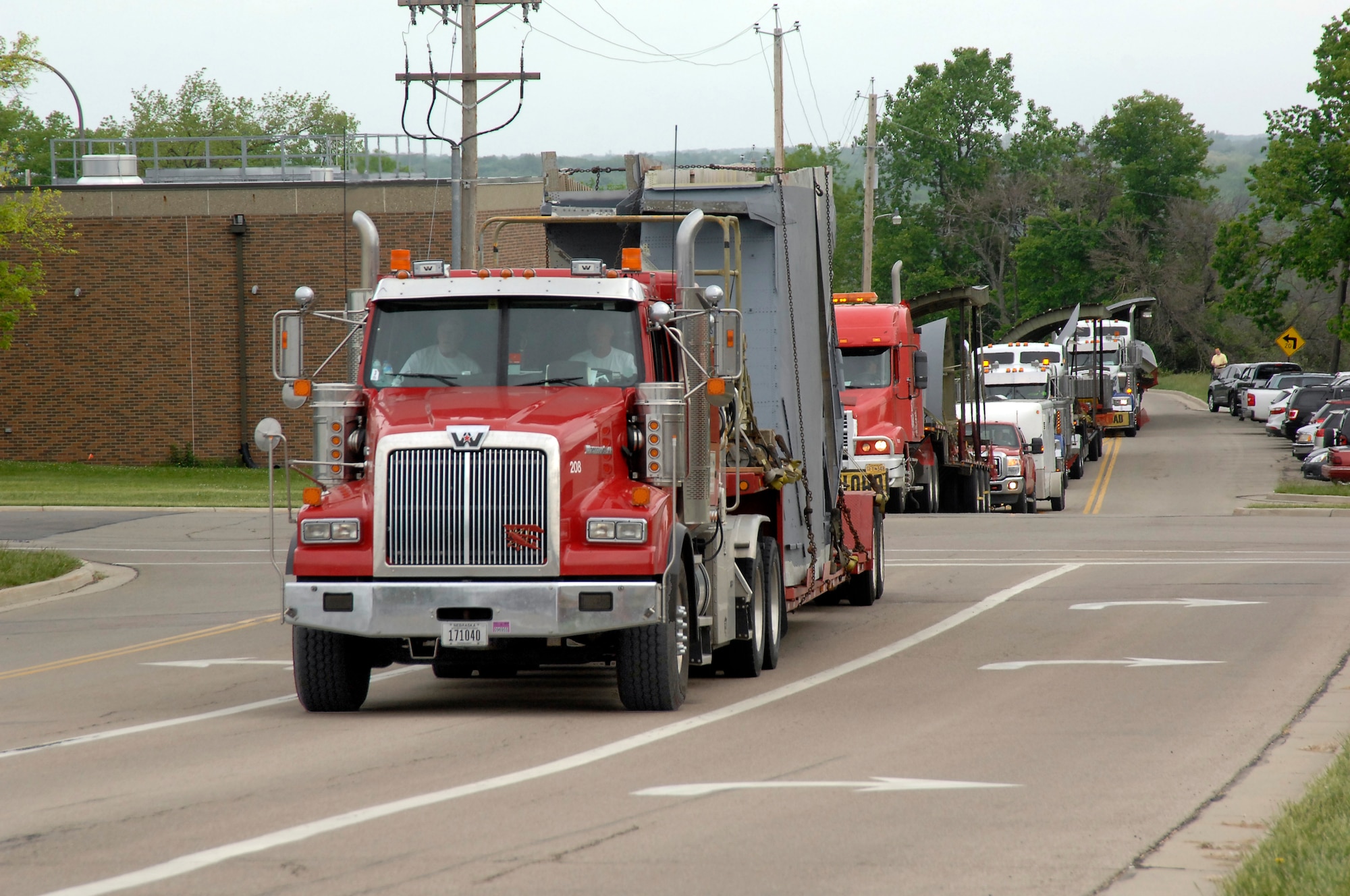 Disassembled sections of a C-17 cargo plane were delivered by truck to Wright-Patterson Air Force Base, Ohio the morning of May 18, 2015. The pieces are bound for the United States School of Aerospace Medicine (USAFSAM) and the co-located Air Mobility Command (AMC) Detachment 4, Formal Training Unit (FTU) for reassembly into an Aeromedical Evacuation (AE) training station. 