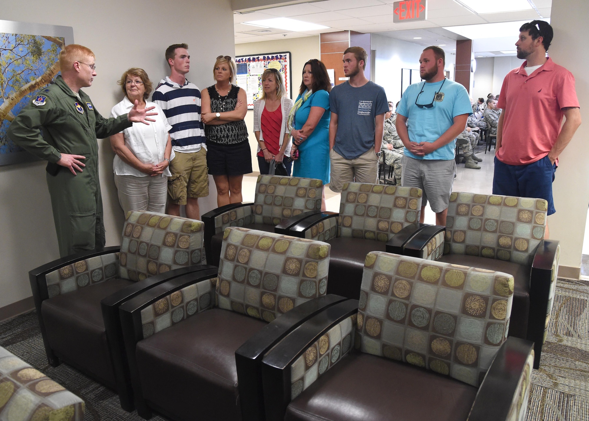 Lt. Col. Christopher Hudson, 559th Aerospace Medicine Squadron commander, explains the 559th Medical Group mission to the Reid family at the Reid Health Services Center May 14, 2015 on Joint Base San Antonio-Lackland, Texas. The Reid clinic was named in honor of Senior Master Sgt. David B. Reid, a former first sergeant who was killed in a C-130 plane crash in 1985. (U.S. Air Force photo/Staff Sgt. Chelsea Browning)