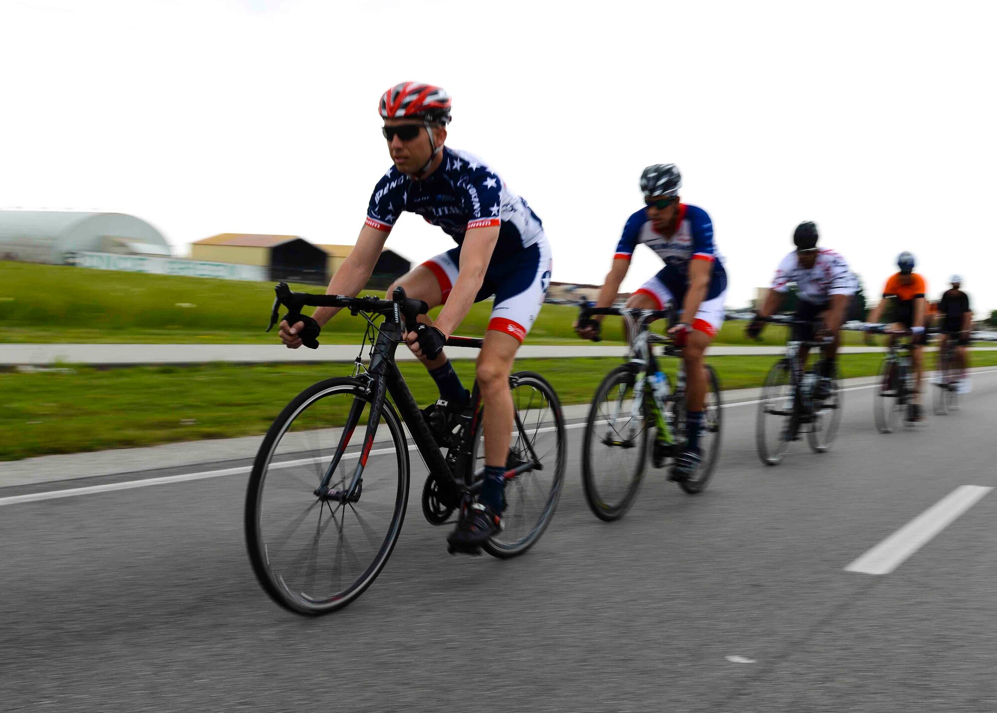 U.S. Air Force Tech. Sgt. Robert Pemberton, 31st Munitions Squadron armament support NCO in charge, and other bikers ride bicycles, May 19, 2015, at Aviano Air Base, Italy. Pemberton is the founder of the Aviano Cycling Club, one of many groups around base dedicated to fitness. (U.S. Air Force photo by Senior Airman Austin Harvill/Released)