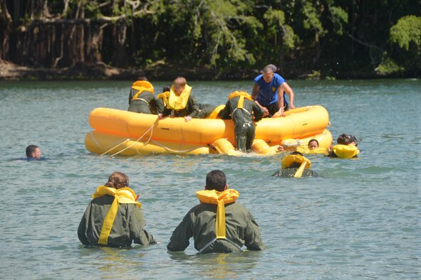 Aircrew members of the 433rd Operations Group perform water survival training May 16, 2015 at Reeds Bay Beach Park, Hilo, Hawaii. Water survival training was part of exercise “Aloha Stampede.” More than 140 members from several squadrons from the 433rd Airlift Wing participated in the event. (U.S. Air Force photo/Minnie Jones)


