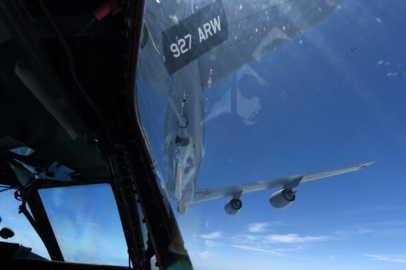 A C-5A Galaxy aircraft from the 433rd Airlift Wing, Joint Base San Antonio-Lackland, Texas approaches the refueling boom of a KC-135 Stratotanker aircraft from the 927 Air Refueling Wing over Hilo, Hawaii, May 16, 2015. Both aircrafts were participating in exercise Aloha Stampede. (U.S. Air Force Photo/Senior Airman Keith James/Released)