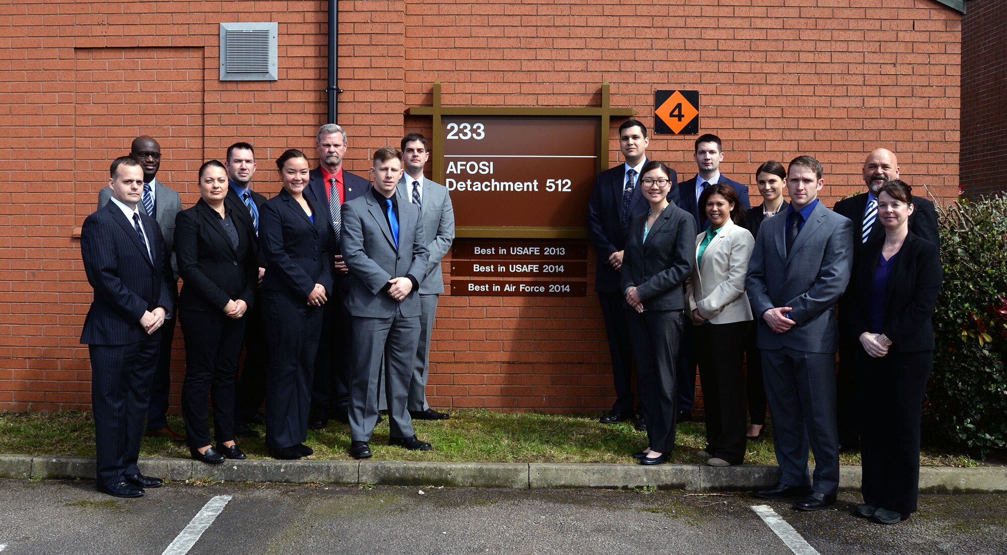 U.S. Air Force Operations of Special Investigations Detachment 512 members pose for a photograph April 29, 2015, on RAF Mildenhall, England. The detachment was awarded the 2014 AFOSI Large Detachment of the Year award. (U.S. Air Force photo by Senior Airman Christine Halan/Released)