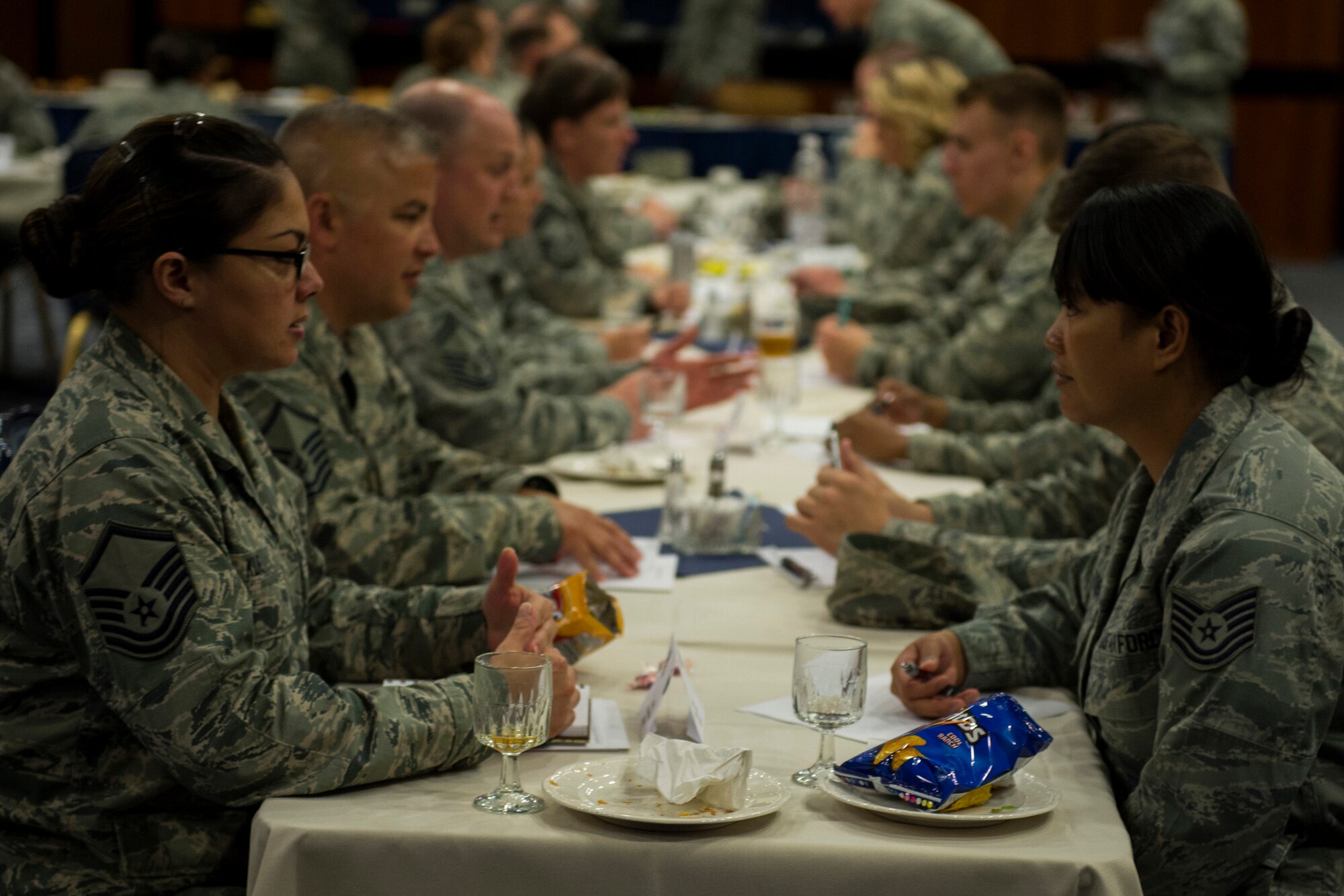 Airmen discuss leadership tactics during a speed-mentoring session at the Club Eifel ballroom on Spangdahlem Air Base, Germany, May 19, 2015. Nearly 50 Airmen participated in the semiannual event. (U.S. Air Force photo by Airman 1st Class Luke Kitterman/Released)