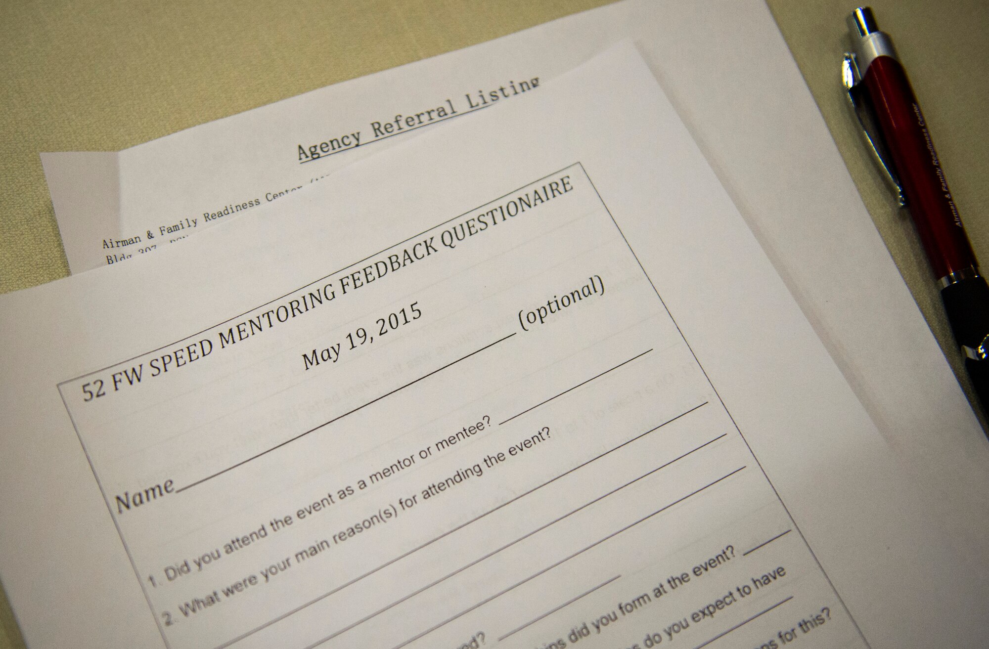 A feedback questionnaire rests on a table during a speed-mentoring session at the Club Eifel ballroom on Spangdahlem Air Base, Germany, May 19, 2015. The session involved senior NCOs mentoring NCOs and junior enlisted Airmen. (U.S. Air Force photo by Airman 1st Class Luke Kitterman/Released)