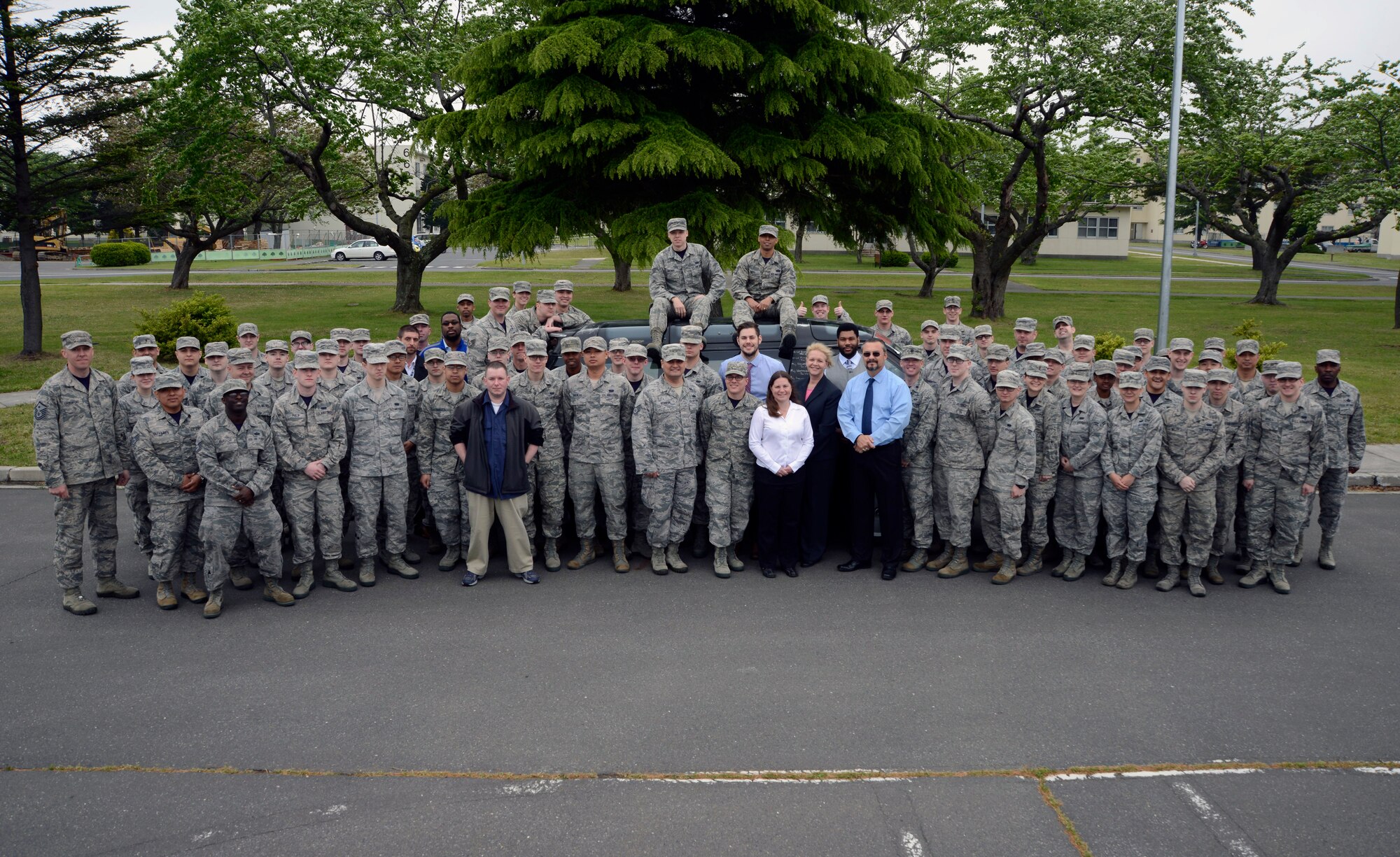 Members of the 35th Communications Squadron stand with the Command Cyber Readiness Inspection team May 14, 2015 at Misawa Air Base, Japan. Misawa received the highest ratings in the Department of Defense for secret and non-classified network security. (U.S. Air Force photo by Staff Sgt. Derek VanHorn/Released)