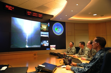 U.S. Navy Adm. Cecil D. Haney (right), U.S. Strategic Command commander, and other command members monitor, from Offutt Air Force Base, Neb., a Minuteman III intercontinental ballistic missile test launch at Vandenberg Air Force Base, Calif., May 20, 2015. The launch supports USSTRATCOM's strategic deterrence mission by obtaining reliability, accuracy and performance factors for use by the USSTRATCOM commander and the Joint Chiefs of Staff. Air Force Global Strike Command, a USSTRATCOM service component, routinely conducts Minuteman III launch tests to verify the accuracy and reliability of the ICBM weapon system. These system tests provide valuable data to ensure a safe, secure and effective nuclear deterrent. The ICBM community, including the Department of Defense, the Department of Energy, and USSTRATCOM will use the data collected from this mission for force development. The ICBM test launch program demonstrates the operational credibility of the Minuteman III and ensures the United States' ability to maintain a strong, credible nuclear deterrent as a key element of U.S. national security and the security of U.S. allies and partners. (USSTRATCOM photo by Jim Lamar/Released)