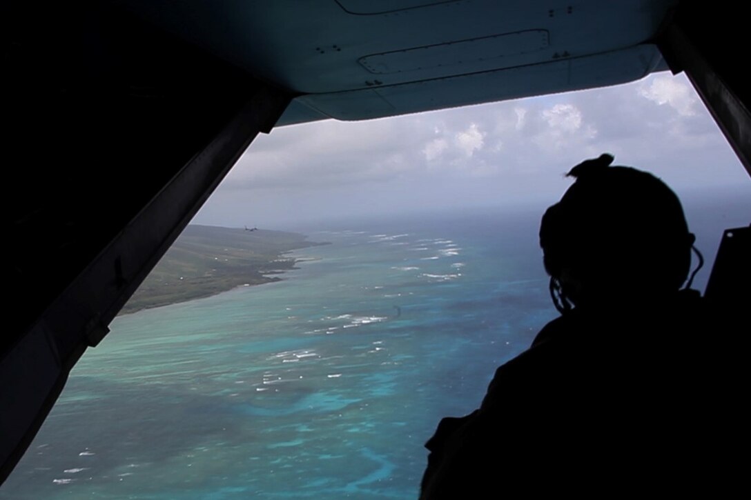 U.S. Marines with the 15th Marine Expeditionary Unit depart the USS Essex (LHD 2) in MV-22B Ospreys off the coast of Hawaii, May 19, 2015. These Marines demonstrated the capabilities of an amphibious raid during the U.S. Pacific Command Amphibious Leadership Symposium (PALS). PALS is designed to bring together senior leaders from allied and partner Marine Corps, naval infantries and militaries around the Pacific with interest in military amphibious capability development. (U.S. Marine Corps photo by Staff Sgt. Miguel Carrasco/Released)