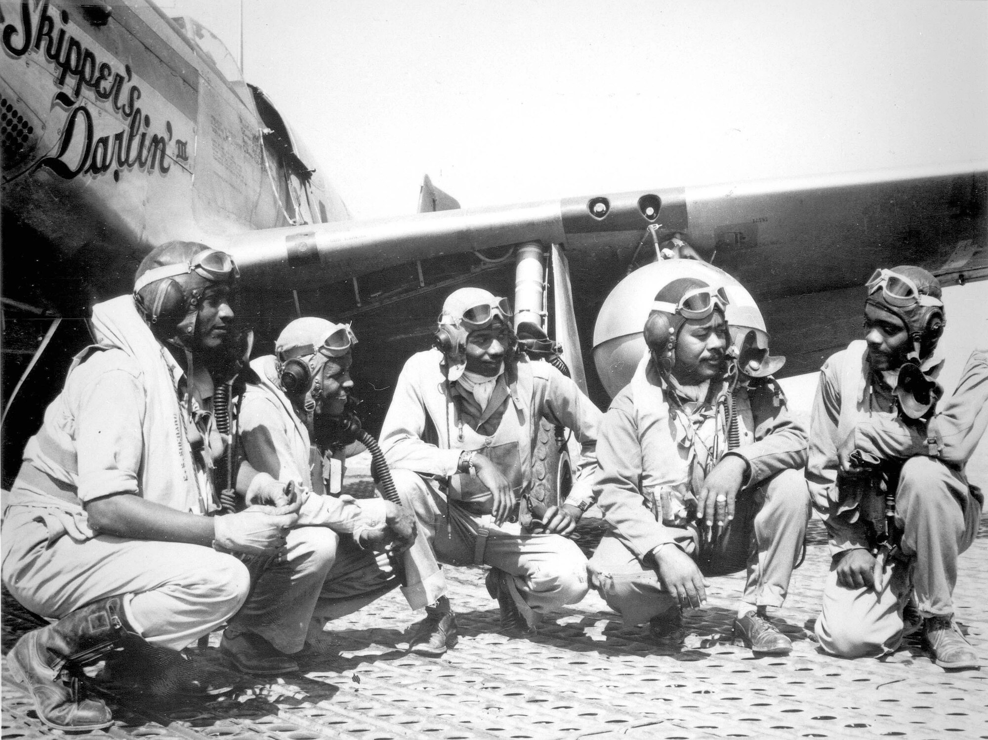 RAMITELLI, Italy -- (From left) Lt. Dempsey W. Morgran, Lt. Carroll S. Woods, Lt. Robert H. Nelron Jr., Capt. Andrew D. Turner and Lt. Clarence P. Lester were pilots with the 332nd Fighter Group.  The Airmen with the elite, all-black fighter group were better known as Tuskegee Airmen.  (U.S. Air Force photo)