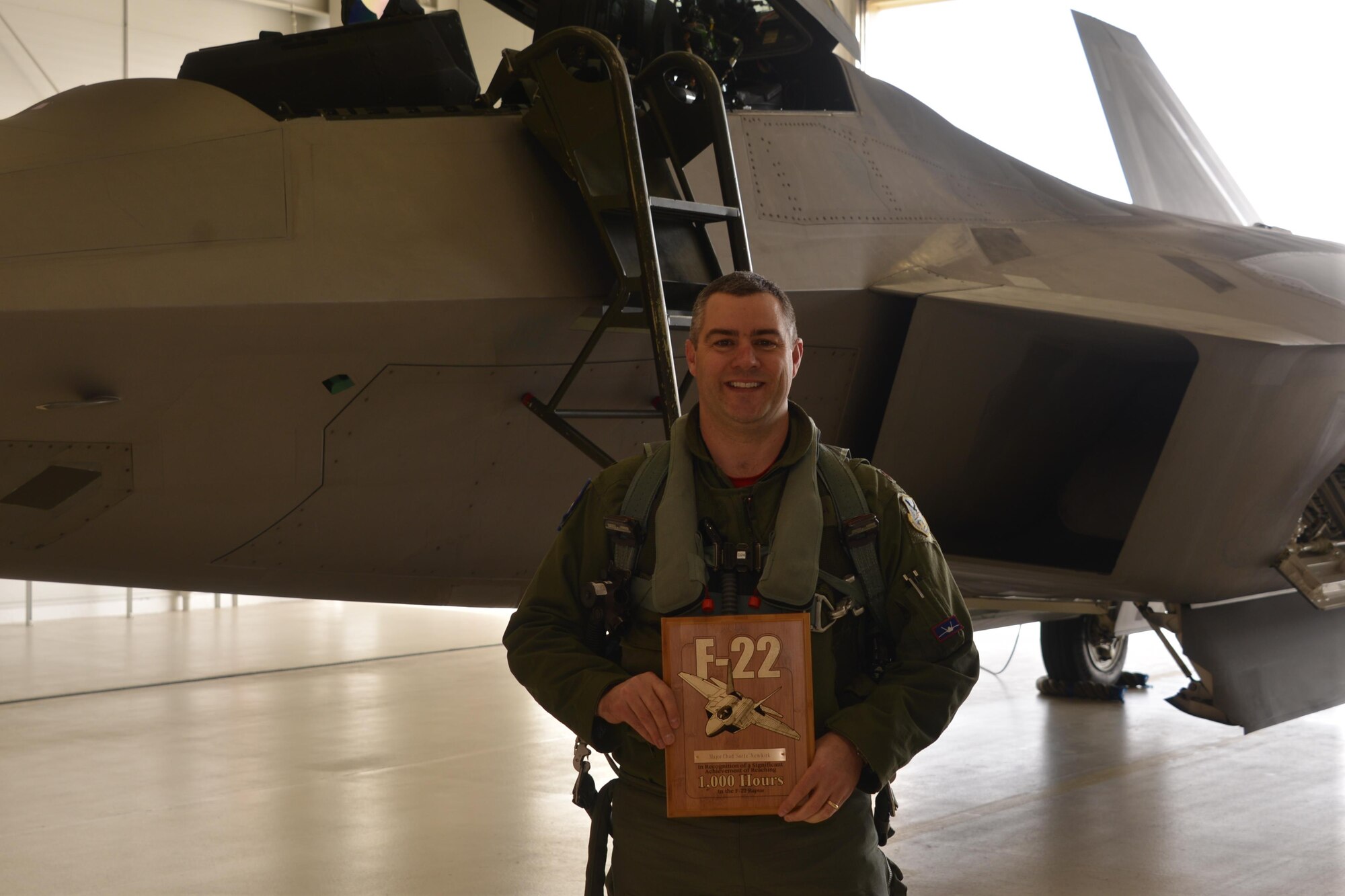 Maj. Chad Newkirk, a Reserve F-22 pilot assigned to the 477th Fighter Group, is the eleventh pilot in Air Force history and fourth pilot in the 477th FG to reach 1,000 flight hours in the F-22 during a sortie here in April. (U.S. Air Force photo/Tech. Sgt. Dana Rosso)
