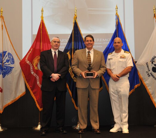 The John Adolphus Dahlgren Award was presented to Eric Rocholl for his technical leadership in support of the Small Surface Combatant Task Force at the Naval Surface Warfare Center Dahlgren Division (NSWCDD) annual honor awards ceremony on May 14, 2015.