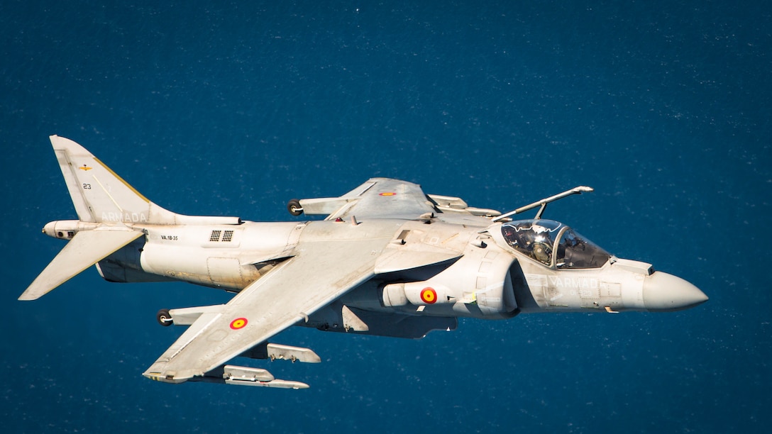 A Spanish Navy Harrier flies over the water after departing Naval Station Rota, Spain, for an aerial-refueling exercise with U.S. Marines from Special-Purpose Marine Air-Ground Task Force Crisis Response-Africa May 15, 2015. Two Harriers flew behind a U.S. Marine KC-130J, which extended two refueling lines to allow the pilots to test their ability to complete inflight-refueling techniques. 