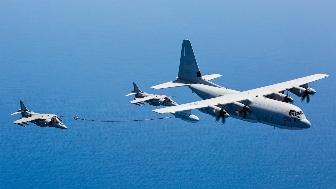 Two Spanish Navy Harriers fly behind a U.S. Marine KC-130J from Special-Purpose Marine Air-Ground Task Force Crisis Response-Africa during an aerial refueling off the coast of Spain May 15, 2015. The Harriers completed a series of linkups with the KC-130J’s refueling lines to hone the two groups’ ability to support each other during bilateral operations. 