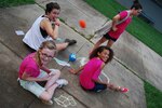 Kids enjoy doing chalk art on concrete at the North Carolina National Guard's Youth Camp at the Betsy-Jeff Penn 4-H Educational Center, located in Reidsville, North Carolina. Summer activities present a safety challenge for members of the military and their families.