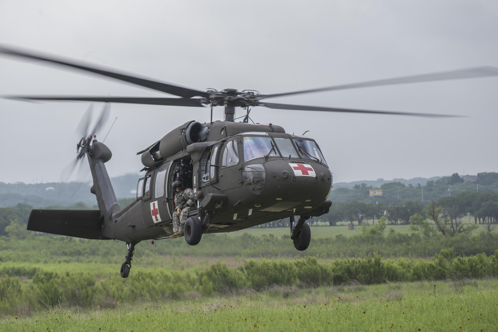 A UH-60 Blackhawk takes off May 7 at Canyon Lake, Texas. Members of the 39th Flying Training Squadron, along with the Texas Army National Guard, Texas Task Force 1 and the Texas Parks and Wildlife Department took part in a helicopter search and rescue training event to remain proficient water rescue and survival techniques. (U.S. Air Force photo by Airman 1st Class Stormy Archer)