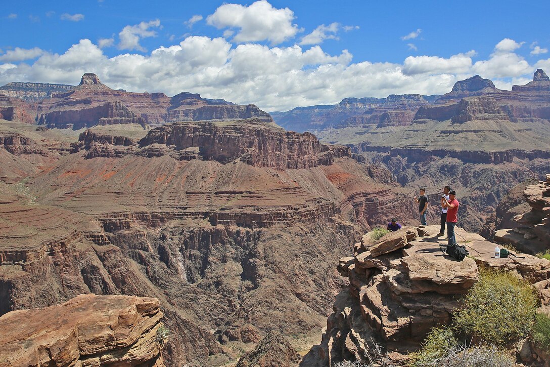 Marines take a scenic view of the Grand Canyon at a plateau during the Single Marine Program Grand Canyon Trip, May 16.The Single Marine Program offers trips to different recreational destinations such as Big Bear Lake, the Grand Canyon, Las Vegas and San Francisco. For more information on the available programs, please visit http://www.mccscp.com/smp