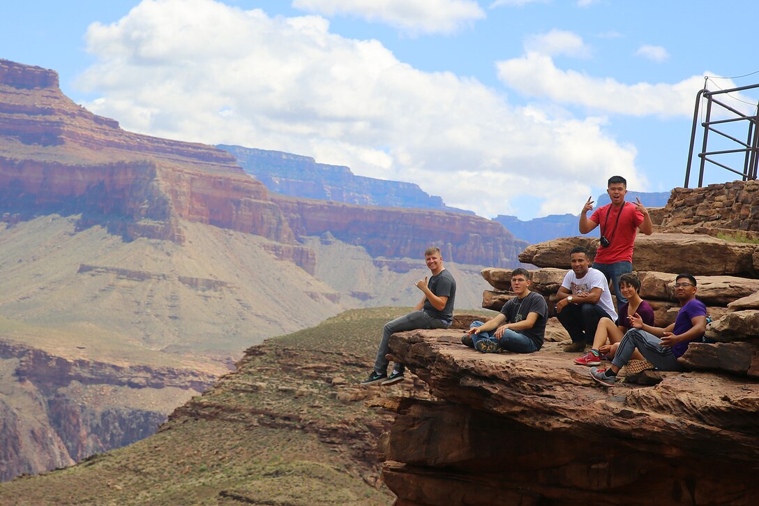 Marines take a scenic view of the Grand Canyon at a plateau during the Single Marine Program Grand Canyon Trip, May 16.The Single Marine Program offers trips to different recreational destinations such as Big Bear Lake, the Grand Canyon, Las Vegas and San Francisco. For more information on the available programs, please visit http://www.mccscp.com/smp